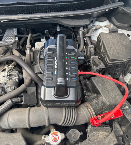 Professional car battery jump start process in Basildon with safe booster connection